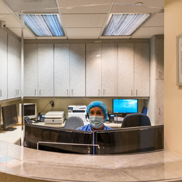 Point of view of a patient looking at the front desk team member at Nancy Shiba, DDS.