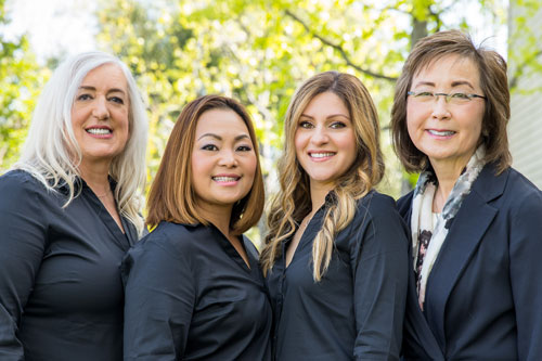 Dr.Shiba and team members outside of office at Nancy Shiba, DDS.