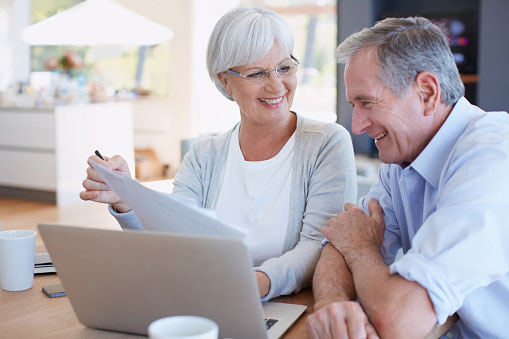 Image of two people reviewing patient information at Nancy Shiba, DDS.