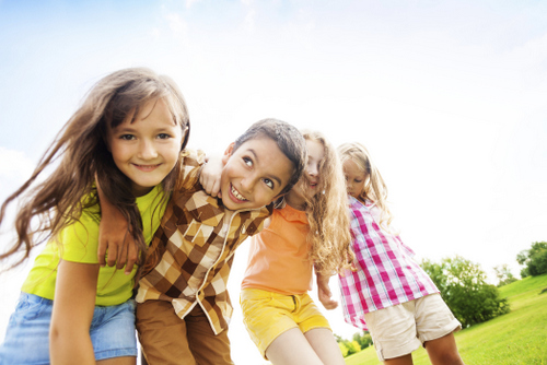 Image of children smiling after family dentistry treatment at Nancy Shiba, DDS.